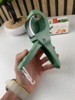 ⁦Coupe fruits et légumes en acier inoxydable multifonction facile à utiliser – قطاعة خضر وفواكه يدوية⁩ - الصورة ⁦7⁩
