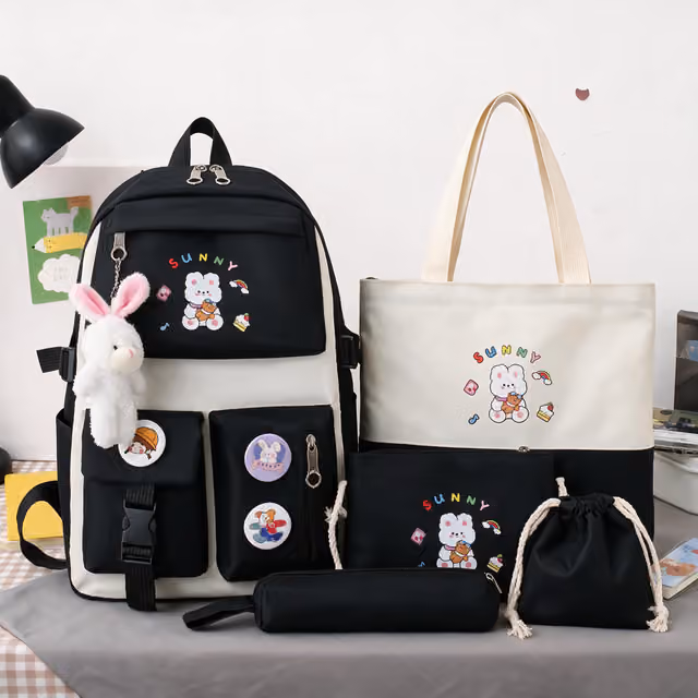 1786191370618-51ogp4 Sac à Dos Multifonctionnel Kawaii Grand Volume Imperméable et Résistant 5Pcs Noir SACKDS15N - حقيبة ظهر بعدة قطع بتصميم كاوايي - الصورة 1